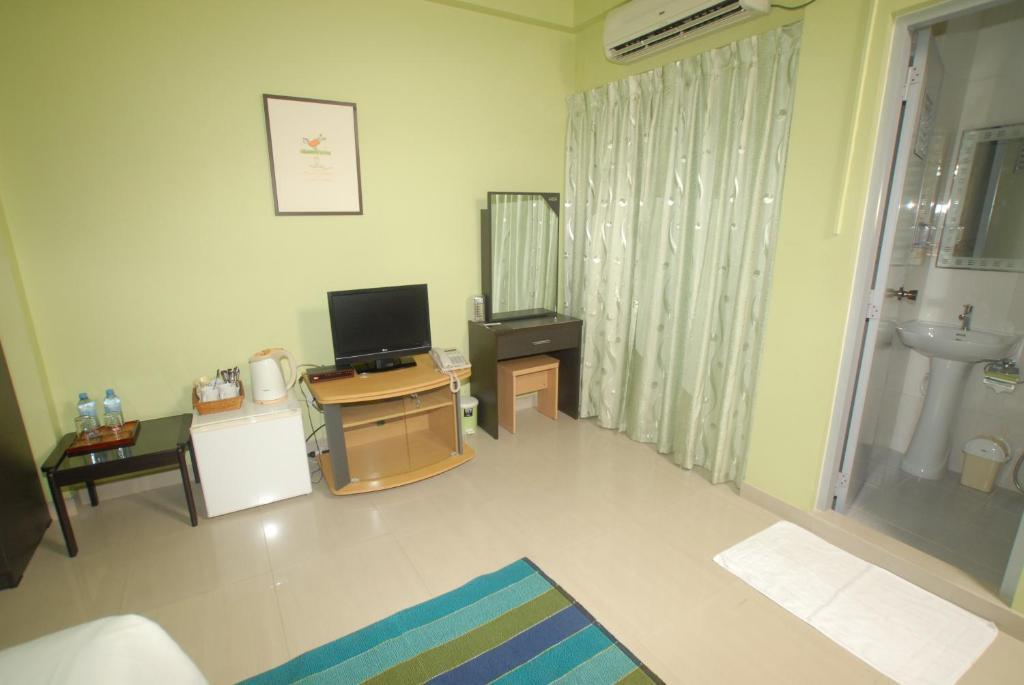 House Clover Malé Rum bild
